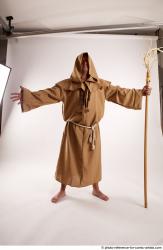 JOEL_ADAMSON STANDING POSE WITH A MAGIC STICK